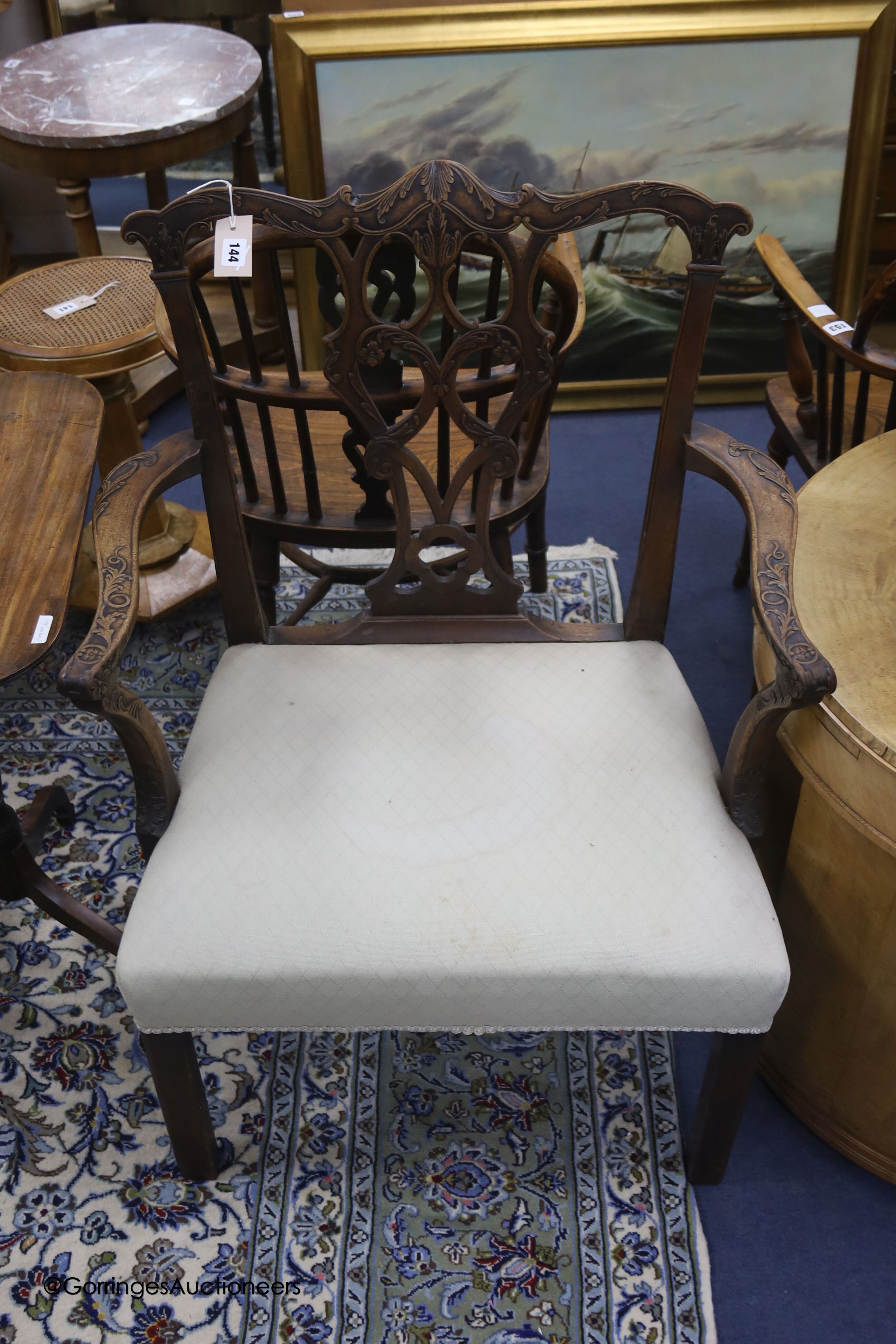A George III Chippendale style mahogany elbow chair, width 69cm depth 50cm height 95cm